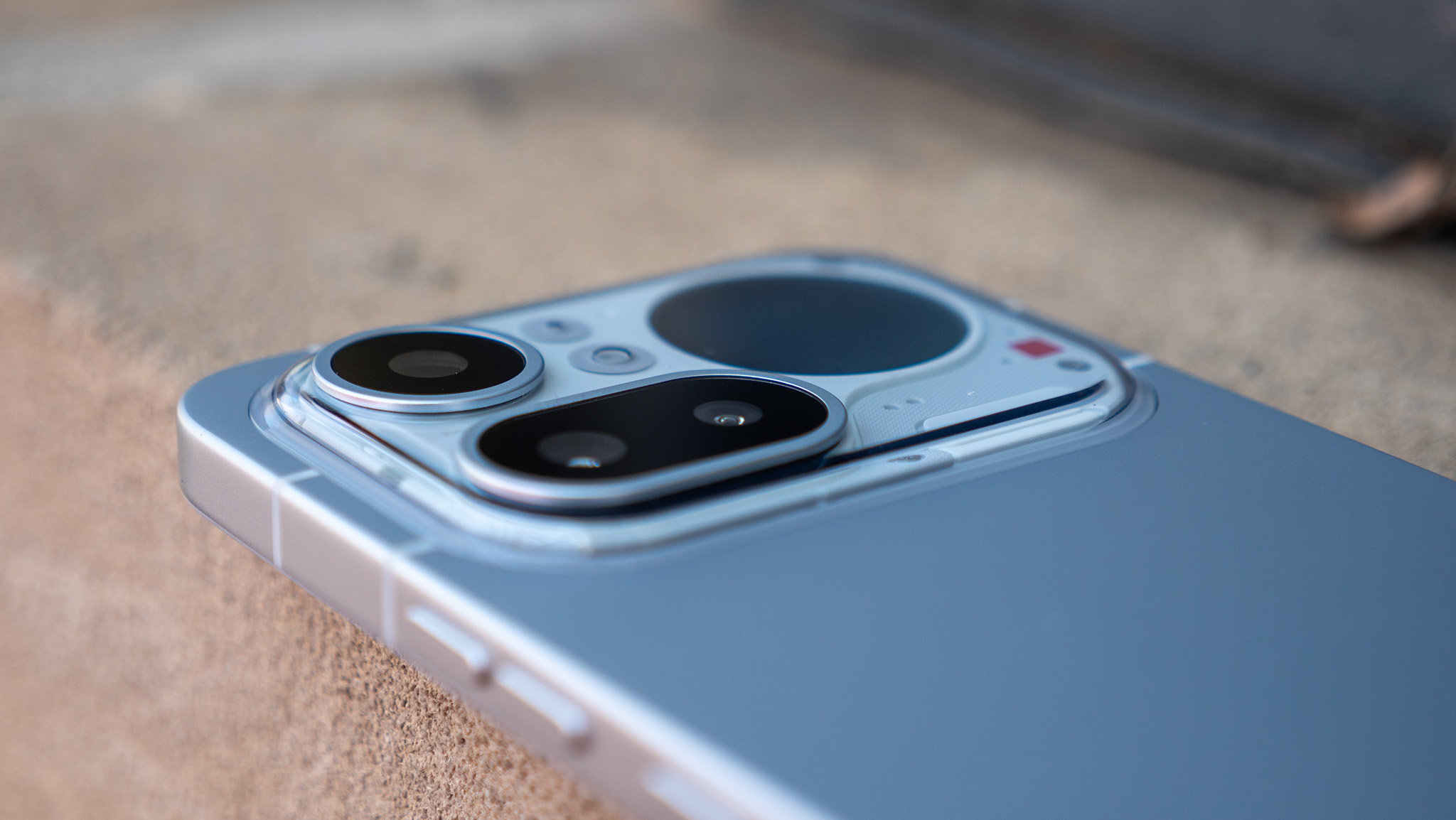 A close-up look at the buttons, ports, and camera lenses on the Nothing Phone 4a Pro