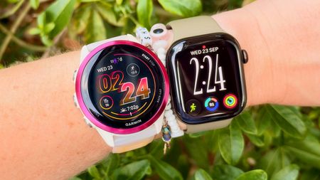 a photo of the Apple Watch Series 12 and Garmin Forerunner 570