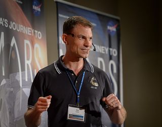 Stan Love, NASA astronaut, provided pointers for the risks and rewards of exploring Mars.