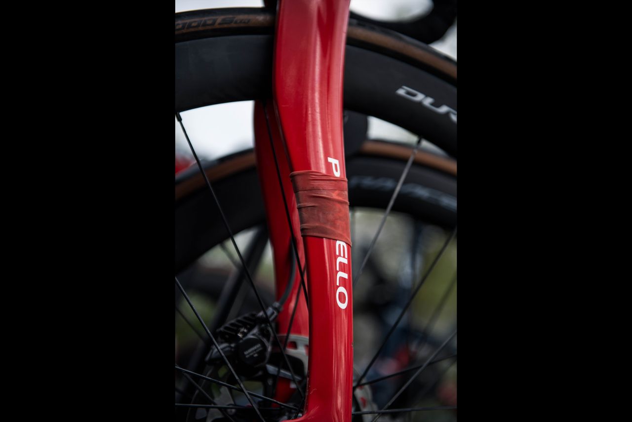 A close up of the latex timing chip cover on the fork of Michal Kwiatkowski's Pinarello Dogma F