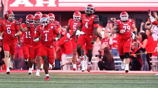 SALT LAKE CITY, UTAH - SEPTEMBER 3: Devon Dampier #4 and Wayshawn Parker #1 of the Utah Utes run onto the field before the start of their game against the Idaho Vandals at Rice-Eccles Stadium on September 3, 2026 in Salt Lake City, Utah. (Photo by Chris Gardner/ Getty Images)