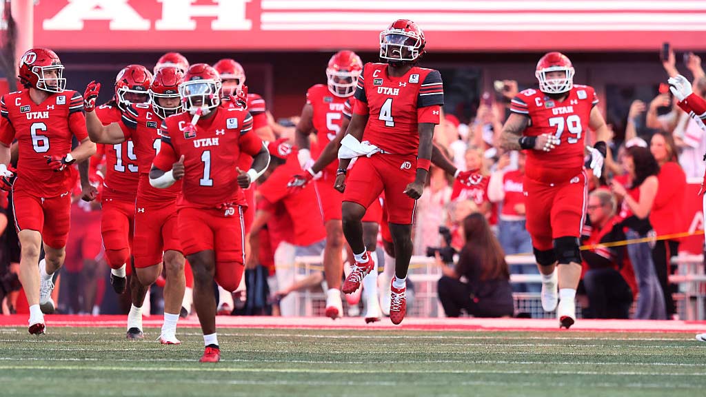 SALT LAKE CITY, UTAH - SEPTEMBER 3: Devon Dampier #4 and Wayshawn Parker #1 of the Utah Utes run onto the field before the start of their game against the Idaho Vandals at Rice-Eccles Stadium on September 3, 2026 in Salt Lake City, Utah.  (Photo by Chris Gardner/ Getty Images)
