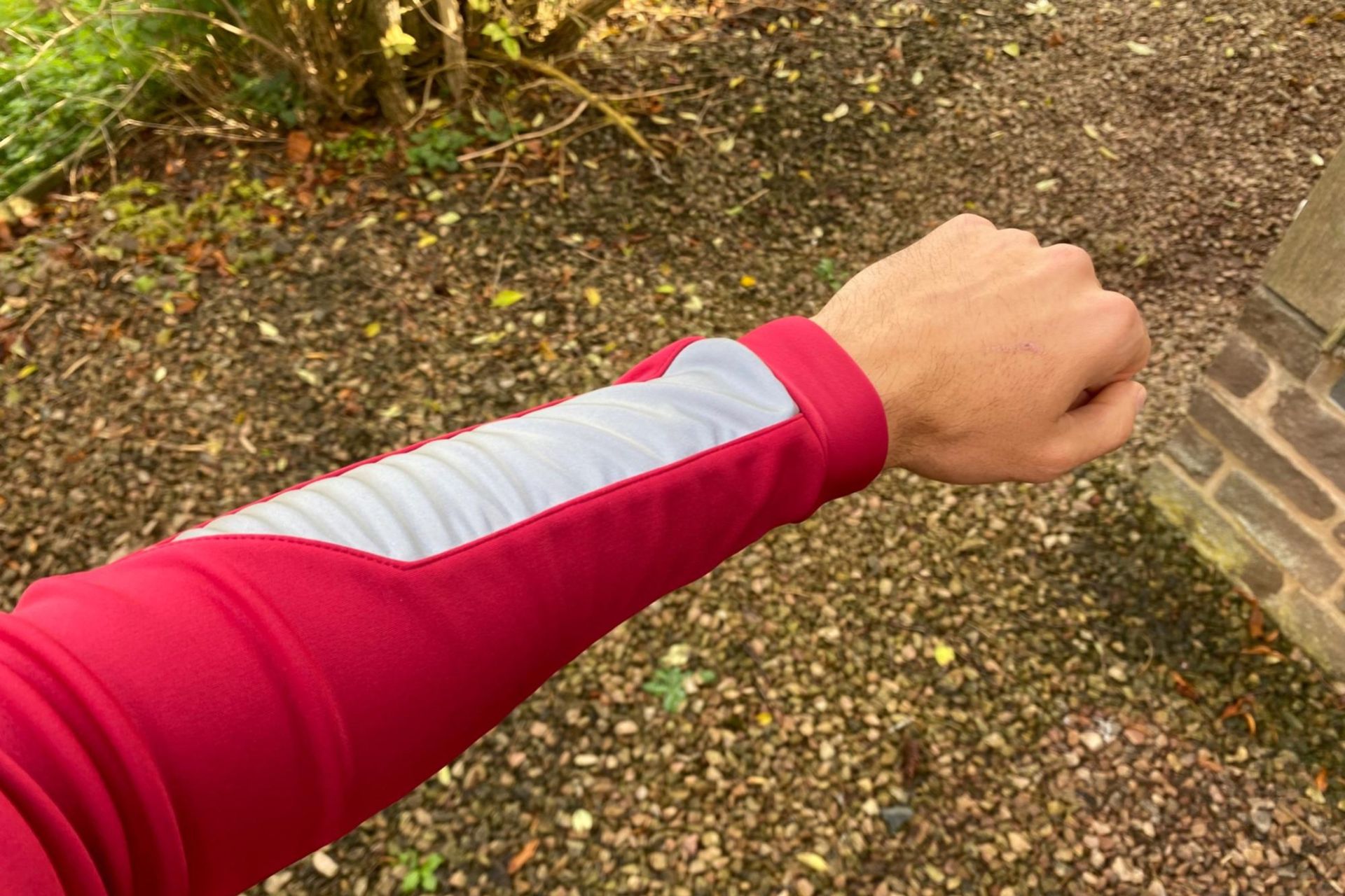 Image shows a rider wearing the Le Col Pro Jacket II.