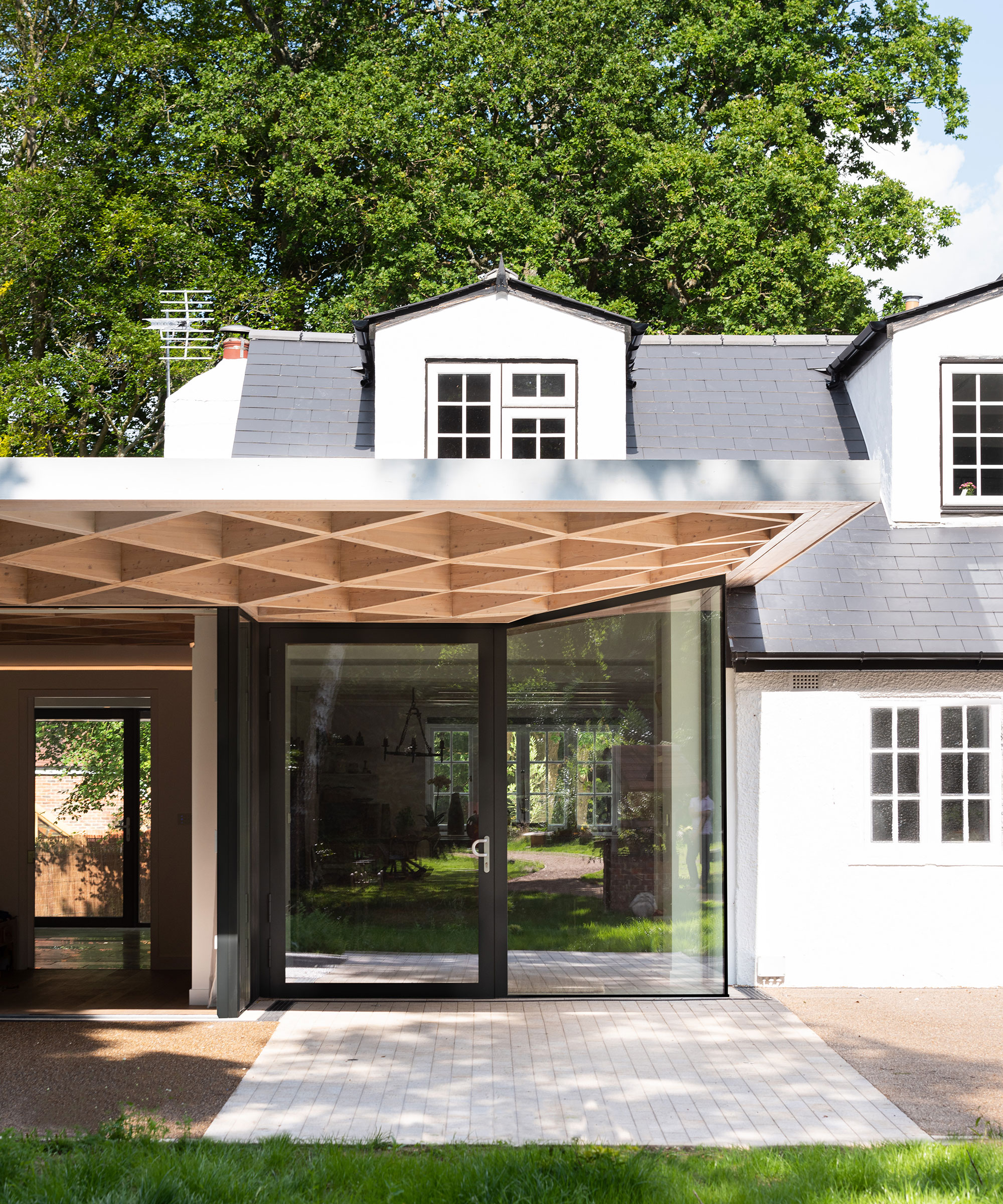 modern dormer bungalow with grid design brise soleil