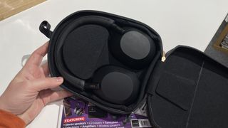 Sony WH-1000XM5 headphones in their carry case