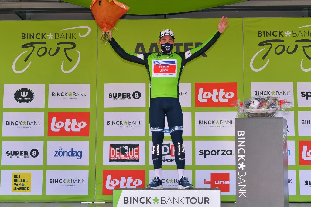 AALTER BELGIUM OCTOBER 01 Podium Mads Pedersen of Denmark and Team Trek Segafredo Green Leader Jersey Celebration Mask Covid safety measures Flowers during the 16th BinckBank Tour 2020 Stage 3 a 157km stage from Aalter to Aalter BinckBankTour BinckBankTour on October 01 2020 in Aalter Belgium Photo by Luc ClaessenGetty Images