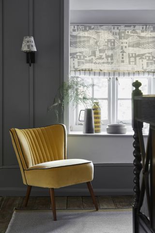 Bedroom chair with blind behind by Vanessa Arbuthnott