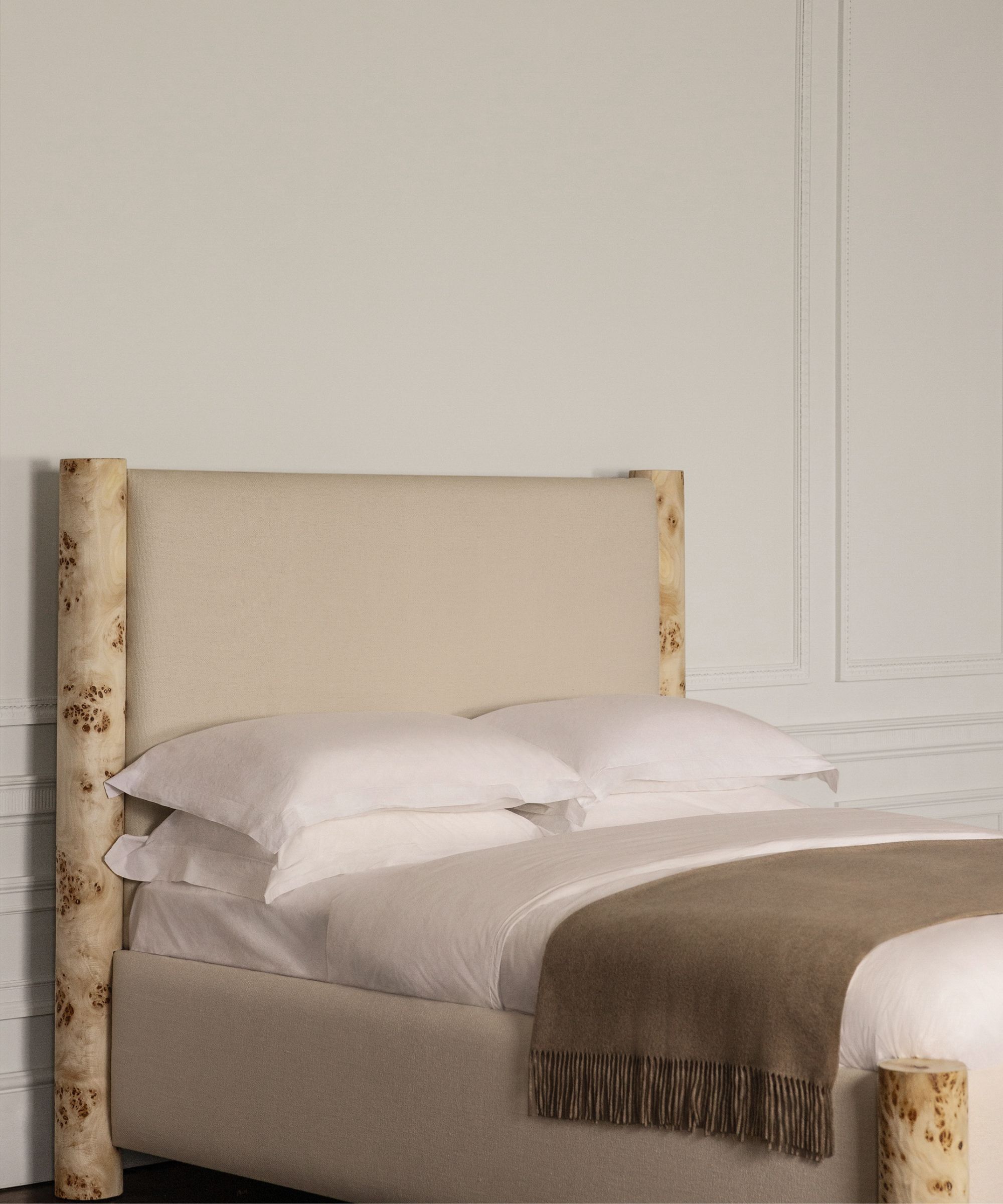 Cream marble and leather bed