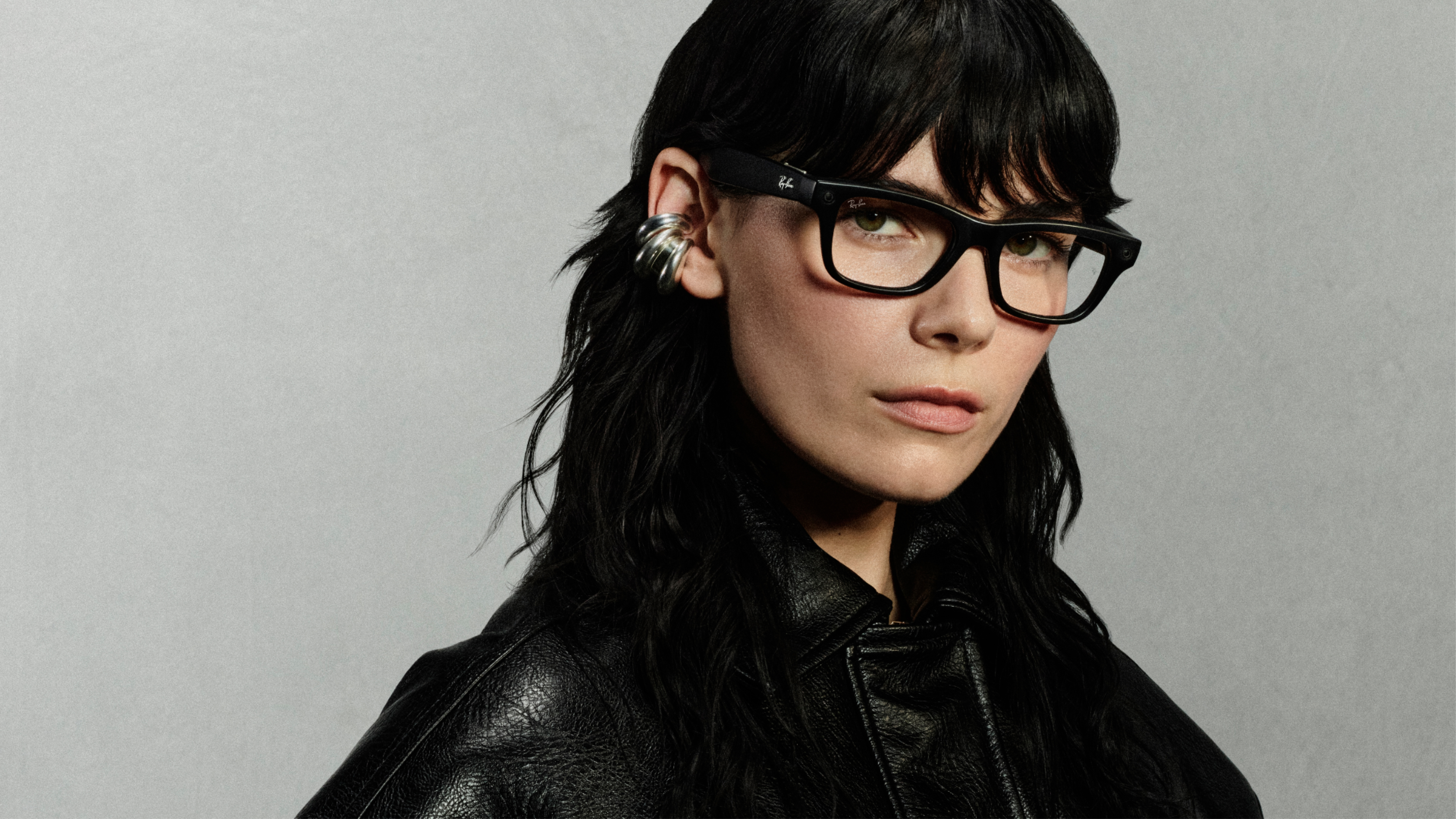 A person wearing the new Meta Ray-Ban Blayzer glasses