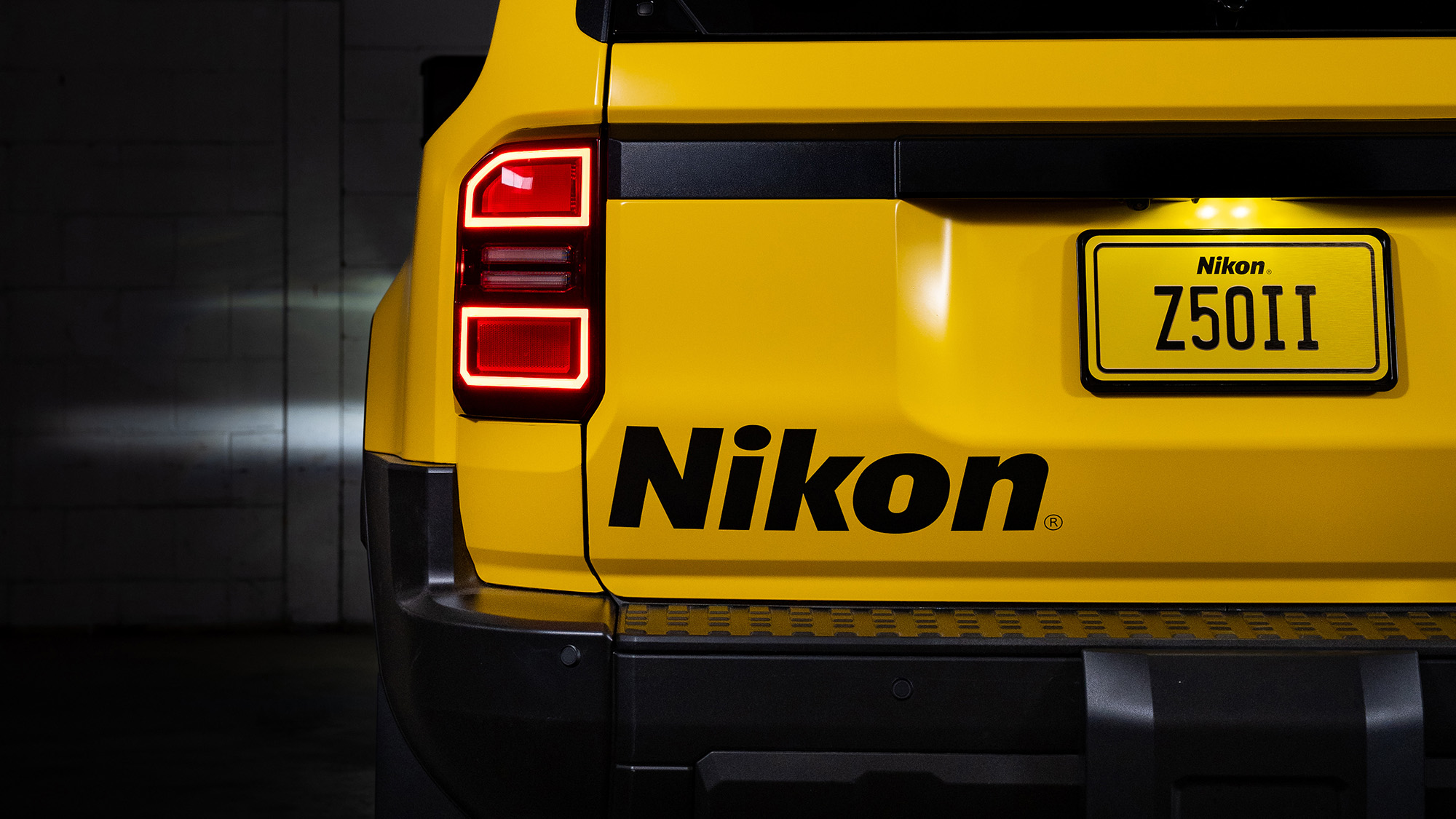 Nikon-yellow and branded Toyota Land Cruiser