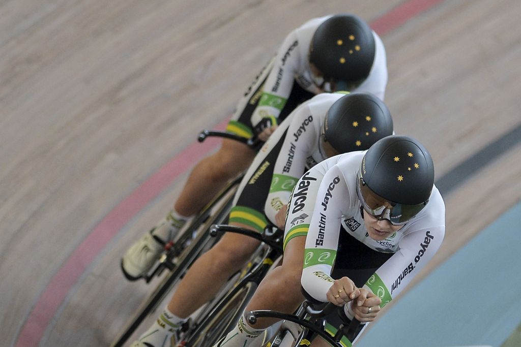 The Australian women's team pursuit squad racing to the gold medal