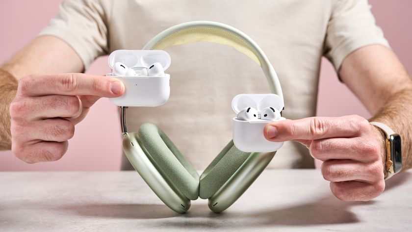 AirPods Pro 2, AirPods 4 and AirPods Max being held together in front of a man&#039;s torso