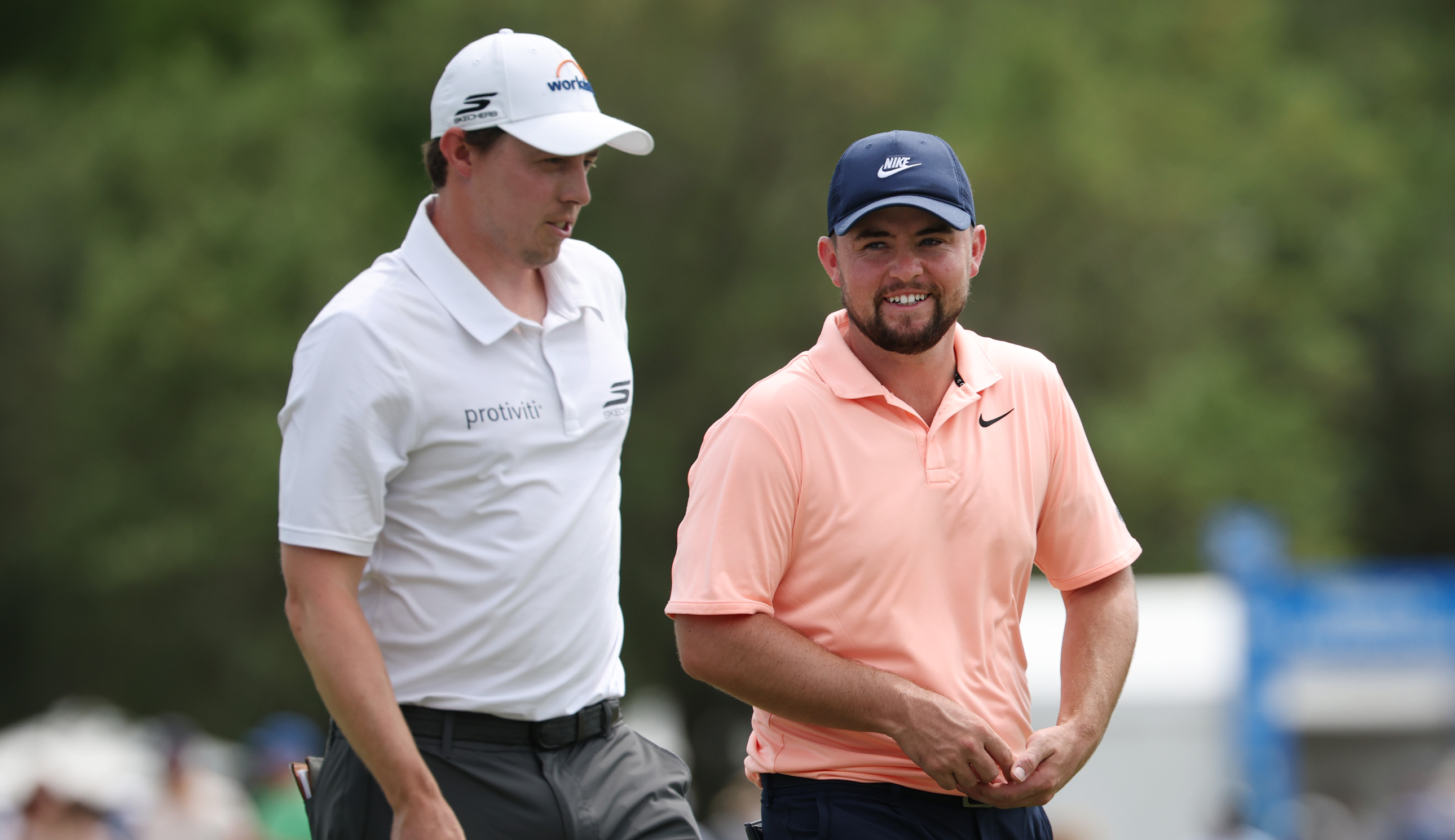 Matt Fitzpatrick and partner Alex Fitzpatrick react as they leave the ninth green during the third round of the Zurich Classic of New Orleans