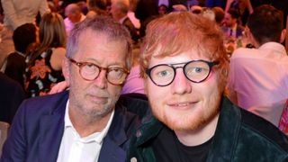 Eric Clapton (L) and Ed Sheeran attend the Ivor Novello Awards 2018 at Grosvenor House, on May 31, 2018 in London, England.