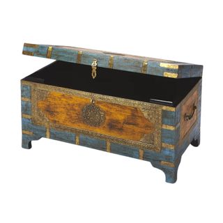 Patterned blue and ochre coffee table trunk with gold detailing