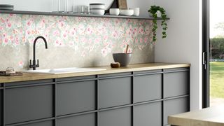 Grey galley kitchen with floral wallpaper under open shelving, as idea for how to organize a small kitchen