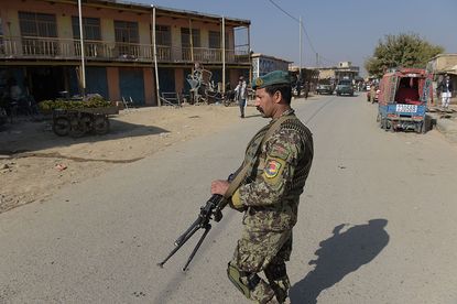 An Afghan soldier keeps guard at Bagram Airfield