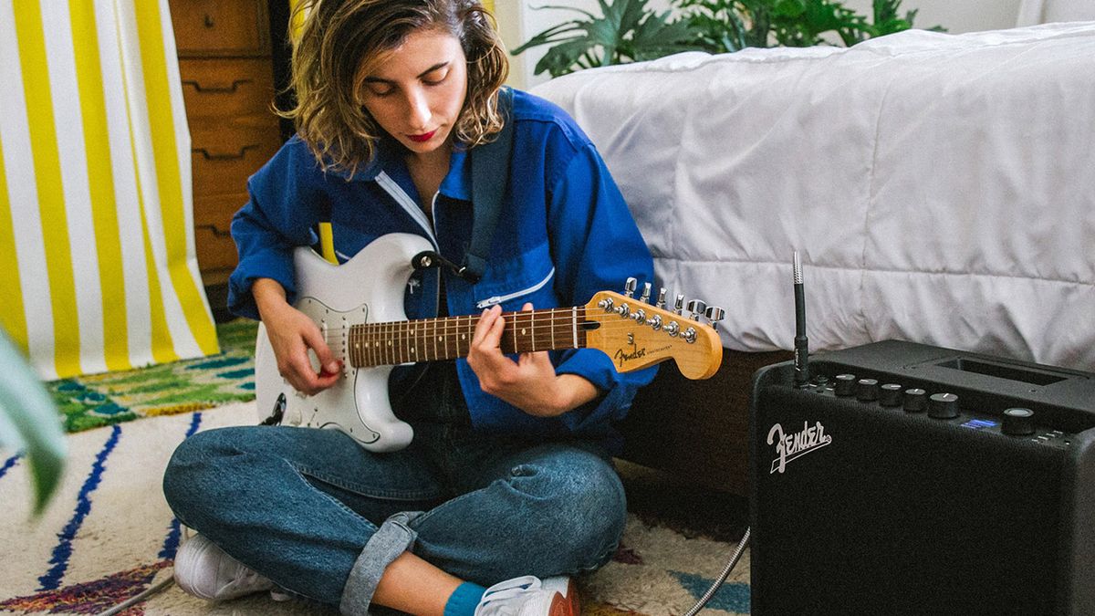 Woman playing guitar