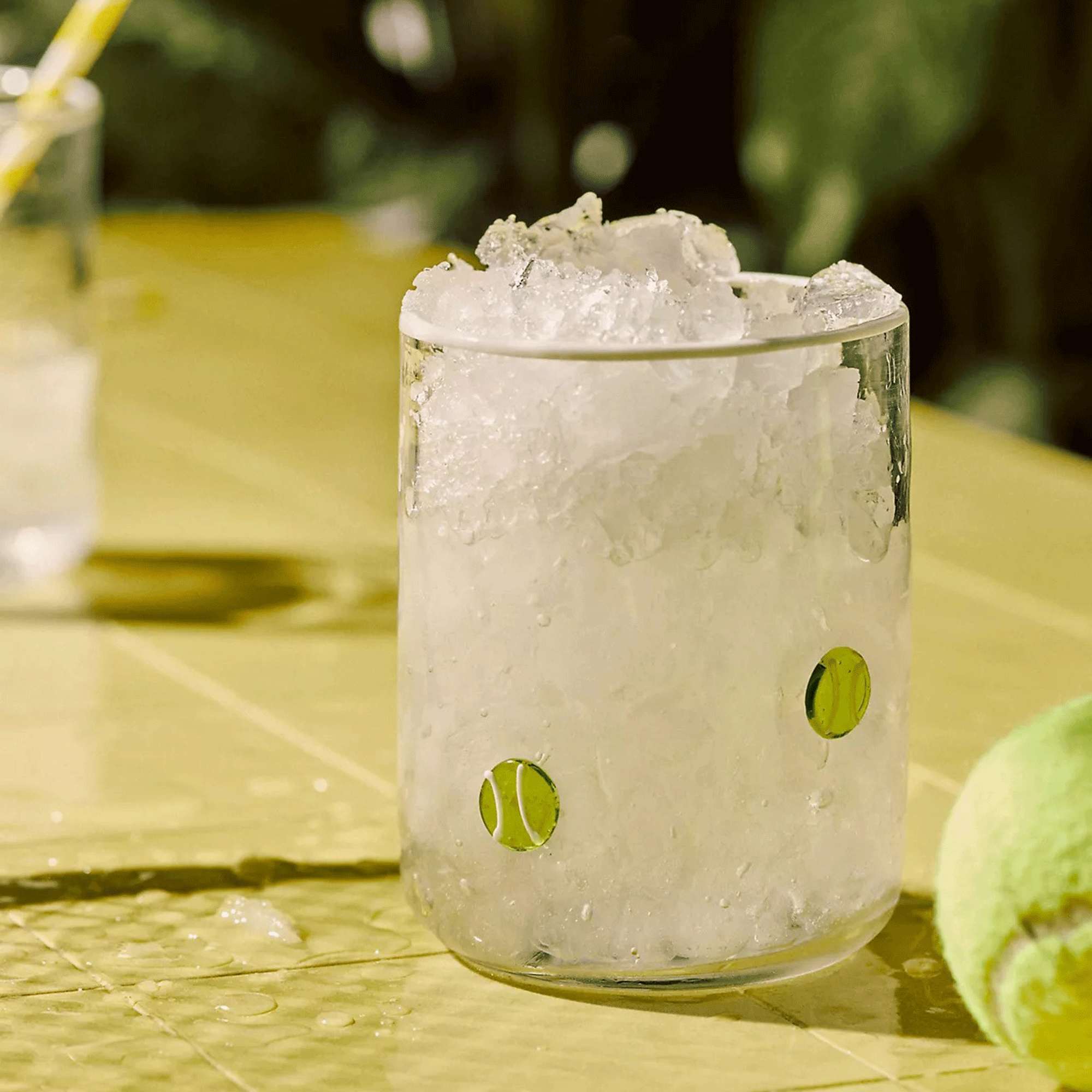 Tennis ball juice icon glass
