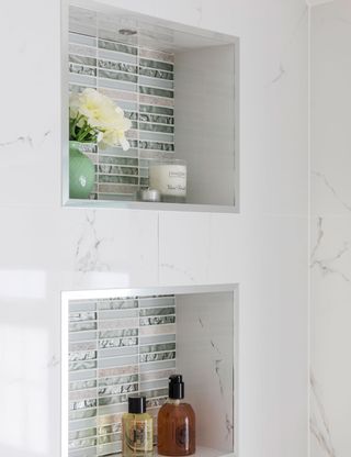 white walled tiles storage area with flower vase