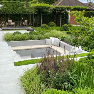 large sunken garden area with seating