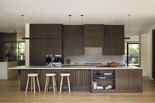 large modern kitchen with ridged wood island