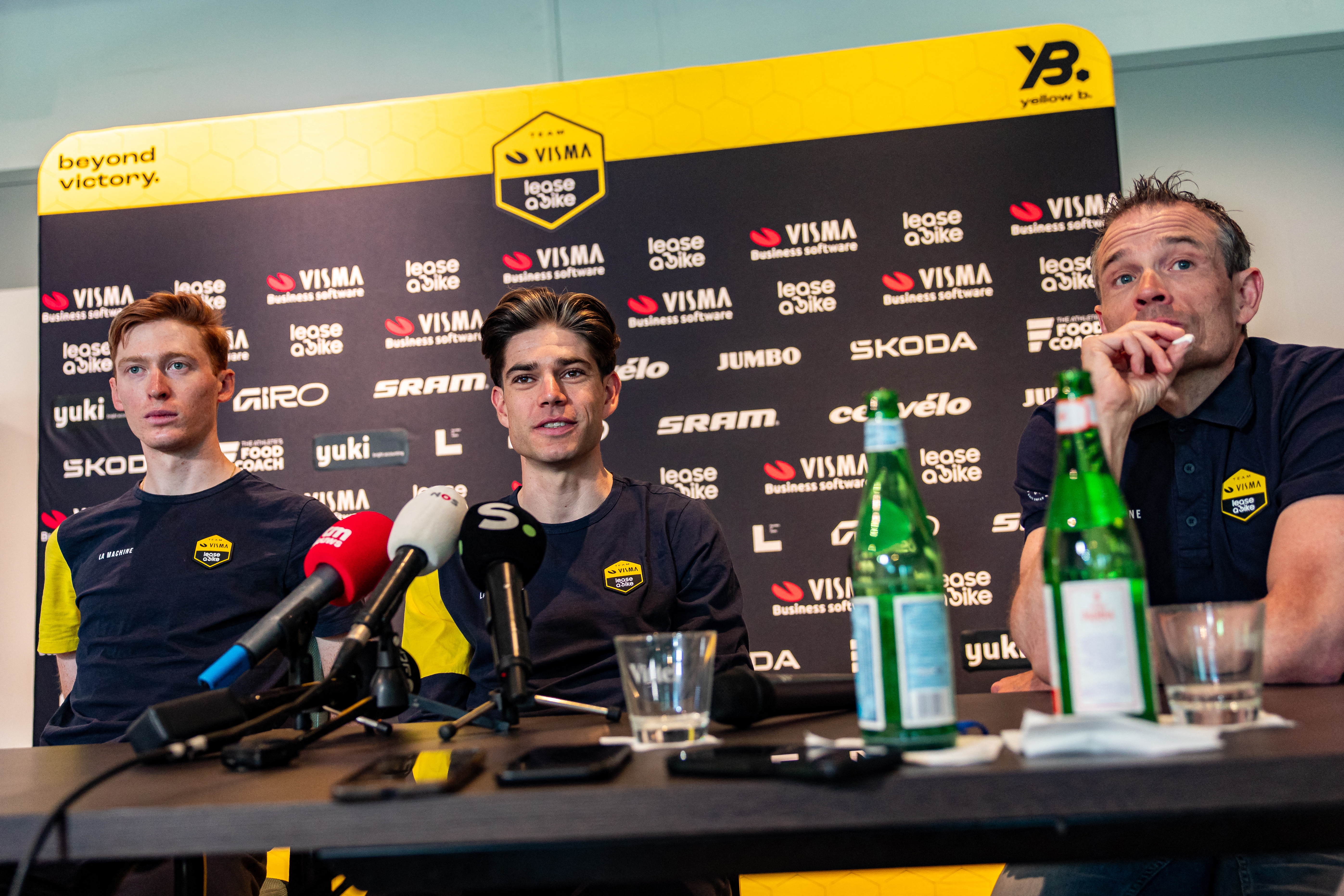(From L) US' Matteo Jorgenson, Belgium's Wout van Aert of sports director Grischa Niermann of Team Visma-Lease a Bike attend a team press conference ahead of the Ronde van Vlaanderen / Tour des Flandres / Tour of Flanders one-day cycling race in Deerlijk on April 4, 2025. The 109th edition of the cycling race will take place on April 6, 2025. (Photo by KURT DESPLENTER / Belga / AFP via Getty Images) / Belgium OUT