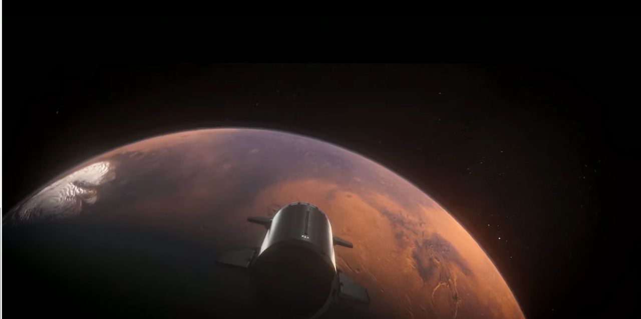 A still from a SpaceX video animation of the company's Starship rocket and Super Heavy booster launching astronauts to Mars, a trip that includes orbital refilling and booster landings.