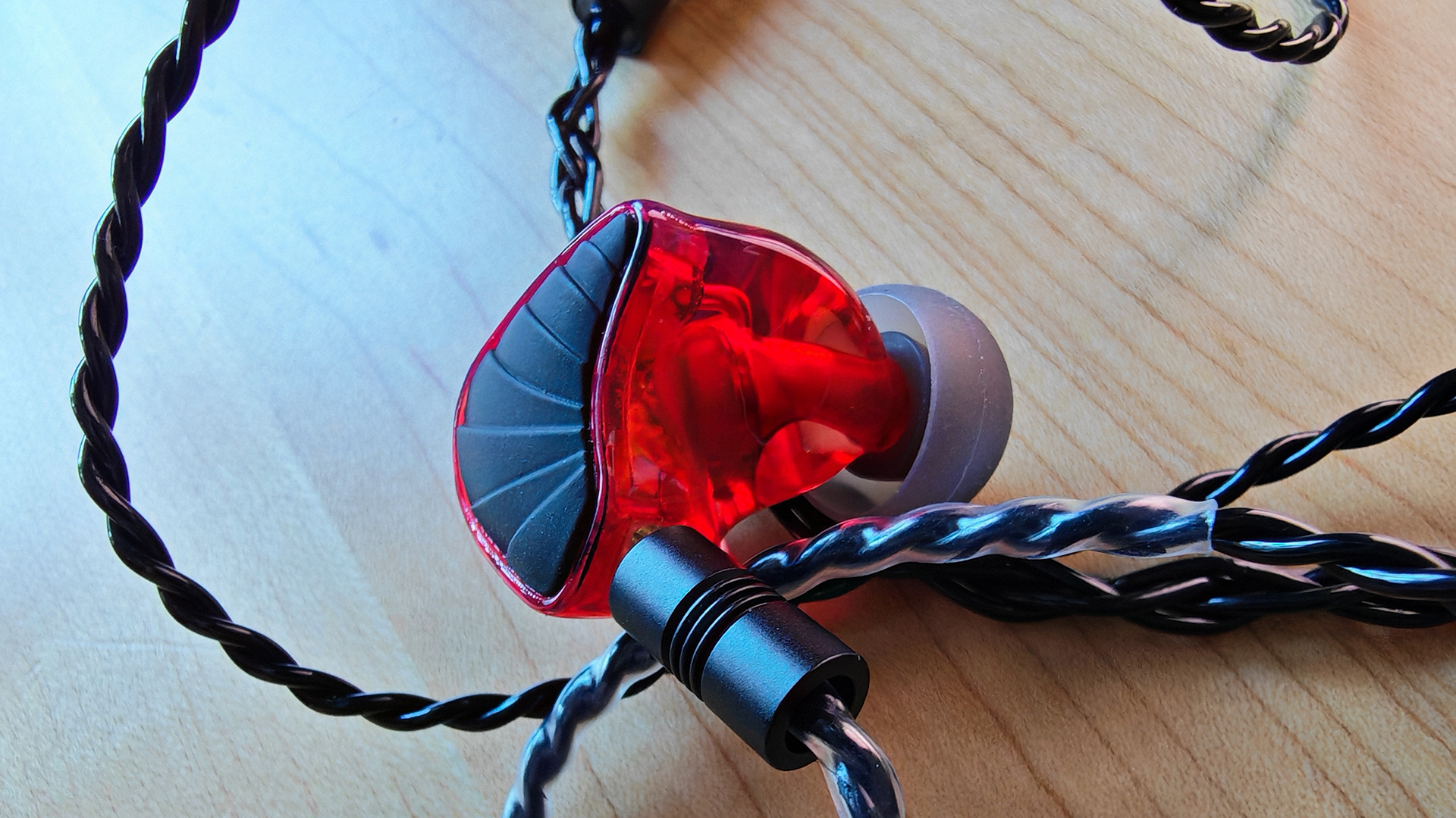 Various photos of the Rock Lobster IEM.