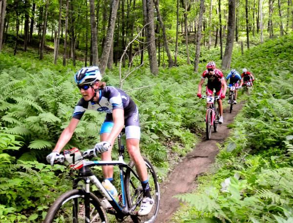 Sam Schultz (Subaru-Trek) leading a select group of four on sweet singletrack.