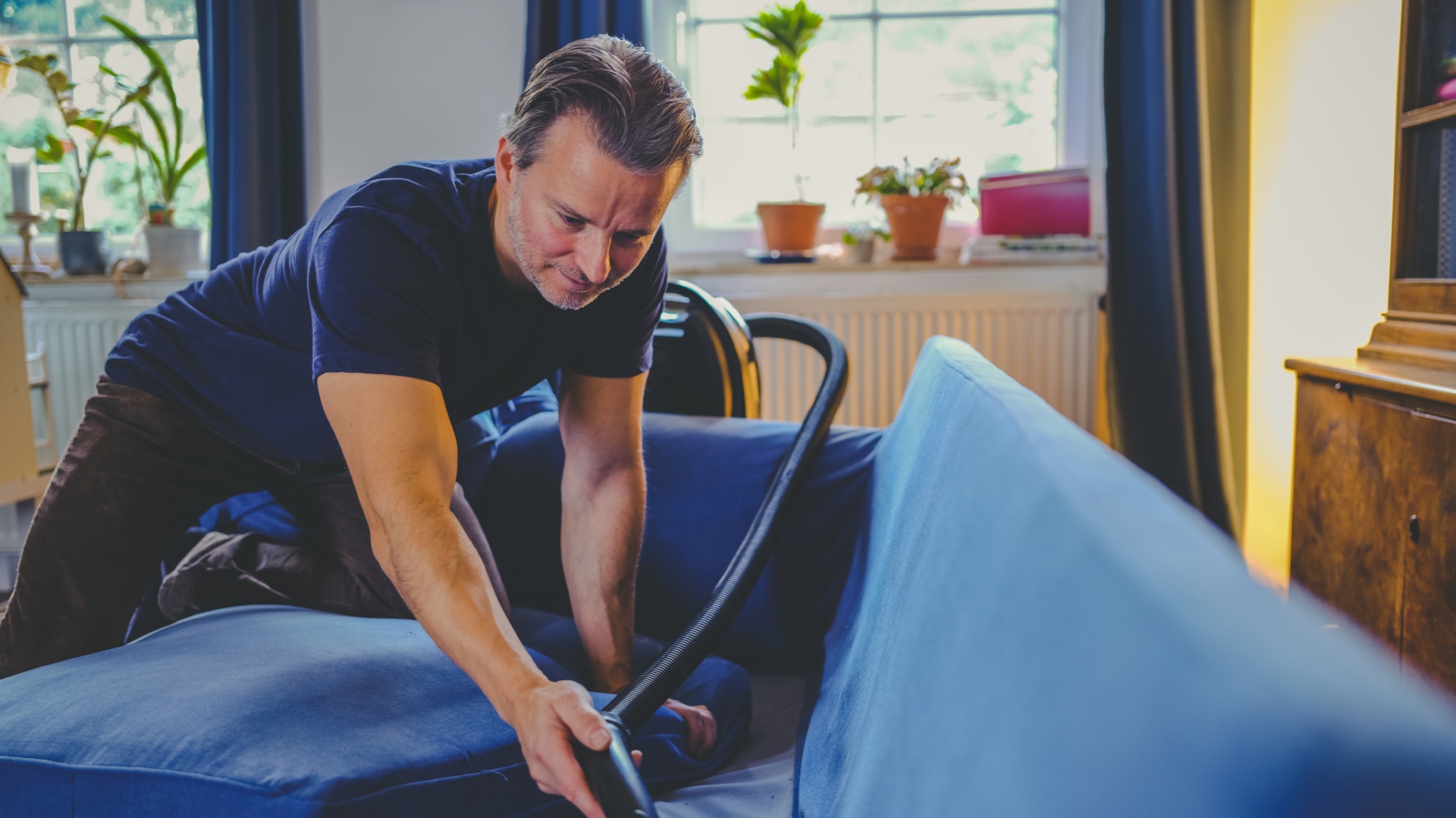 Man vacuuming