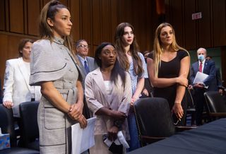 Olympic gymnasts Aly Raisman, Simone Biles, McKayla Maroney and NCAA and world champion gymnast Maggie Nichols leave after testifying during a Senate Judiciary hearing