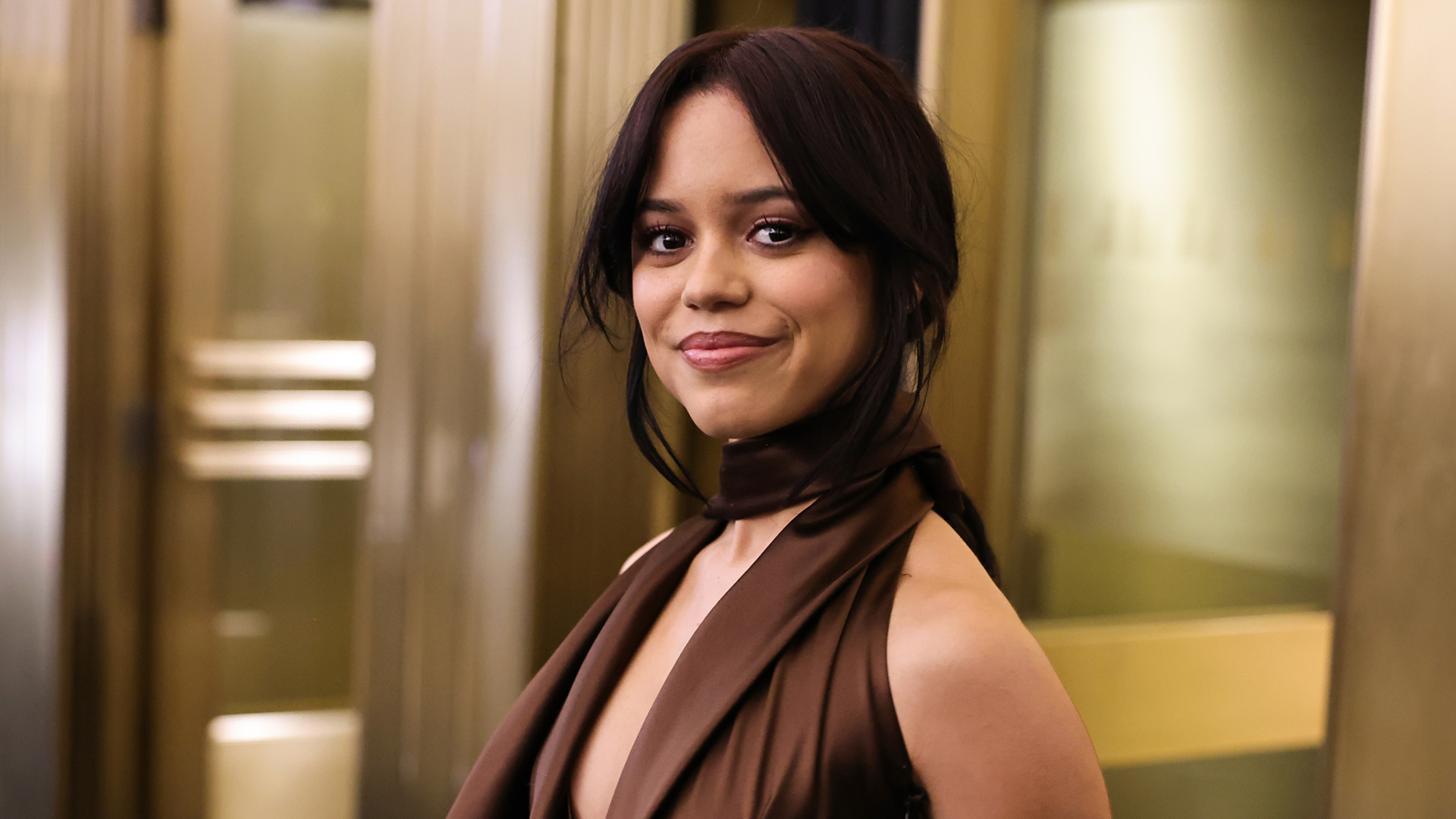 Jenna Ortega styled a puff-sleeve leather skirt set from Givenchy Fall 2025 to kick off her Wednesday Season 2 press tour