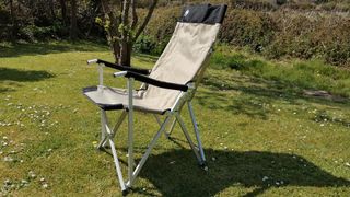 Coleman Sling Chair in a garden