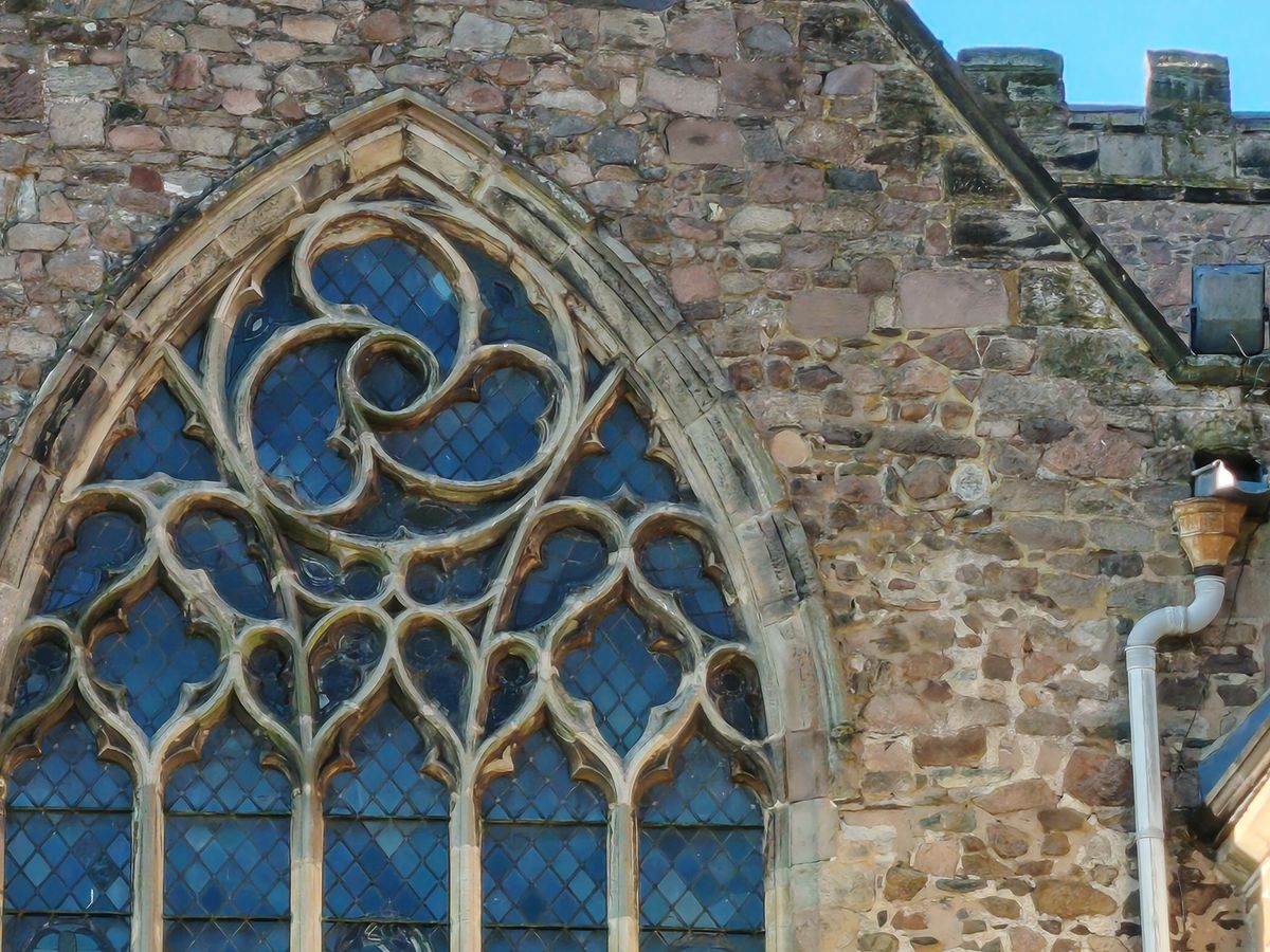 Stone church with large windows