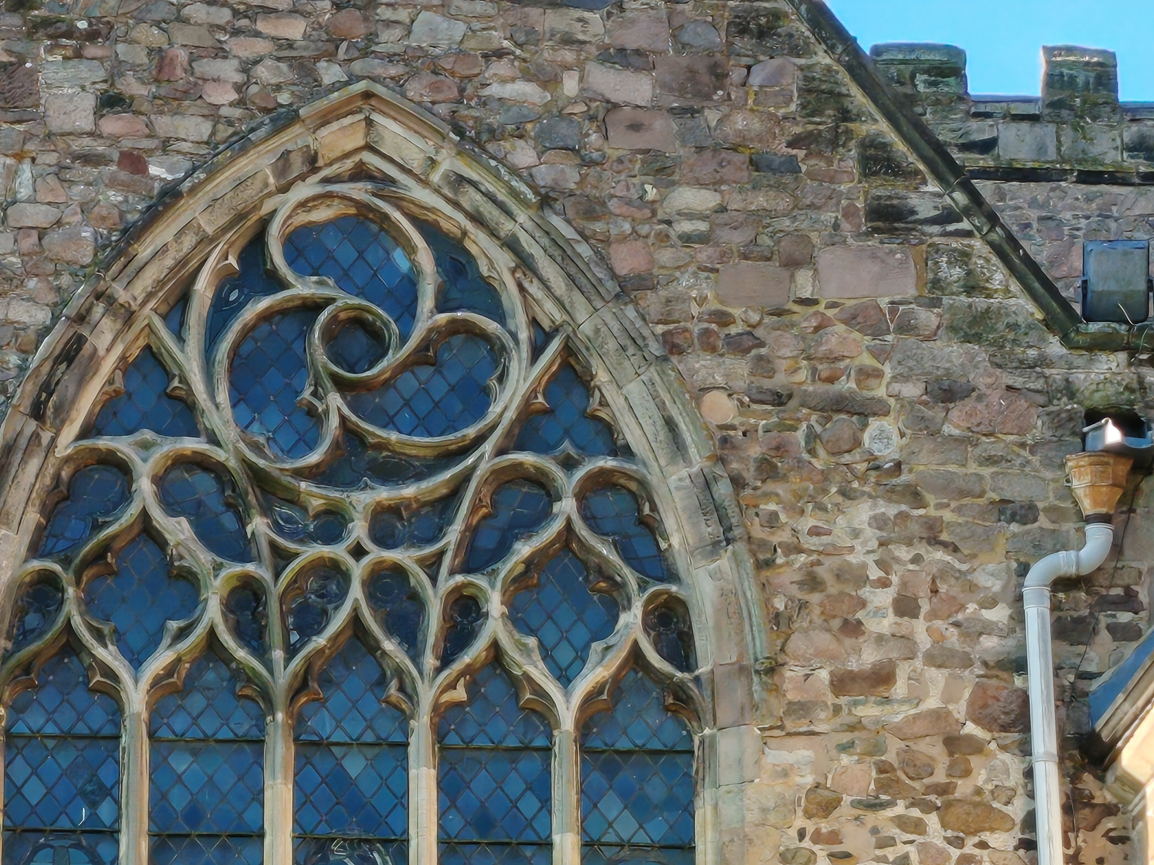 Stone church with large windows