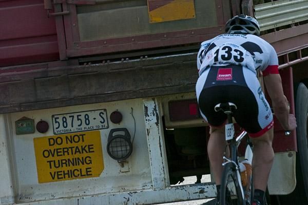 B-Double drafting: Jared Rowney (GE Plumbing) gets some assistance trying to get back onto the peloton during stage three.