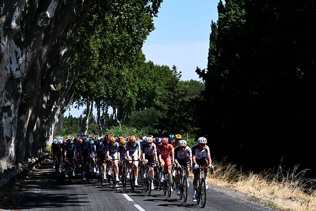 FONT-ROMEU, FRANCE - AUGUST 24: A general view of Tadej Pogacar of Slovenia and UAE Team Emirates XRG - Red Leader Jersey and the peloton competing during the La Vuelta - 81st Tour of Spain 2026, Stage 3 a 174km from Gruissan - Aude to Font Romeu 1941m / #UCIWT / on August 24, 2026 in Font Romeu, France. (Photo by Tim de Waele/Getty Images)