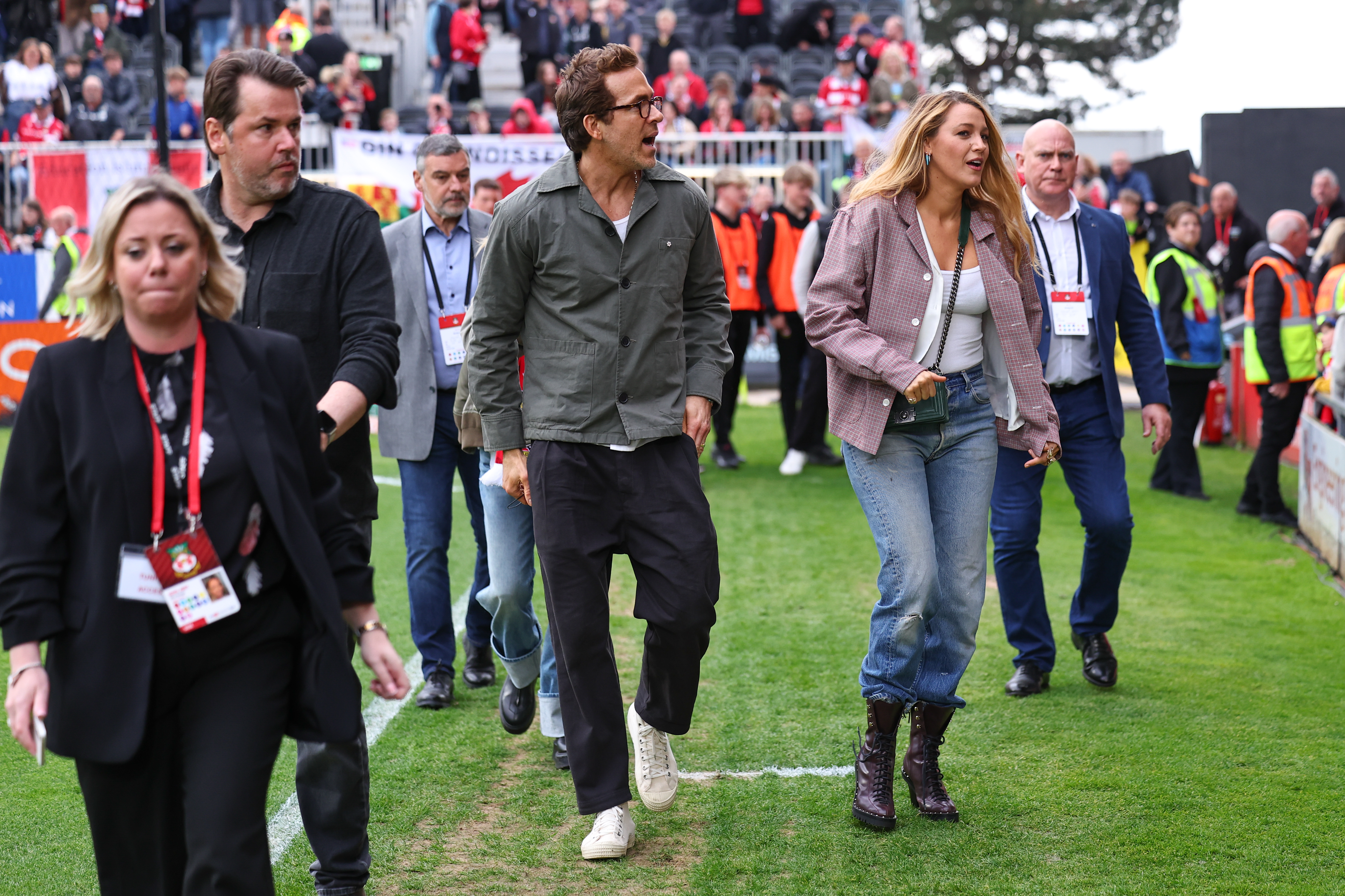 Blake Lively wears a jeans and boots soccer outfit in 2024