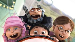 Gru rides a rollercoaster with his three daughters