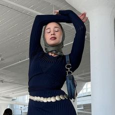 woman wearing knit dress