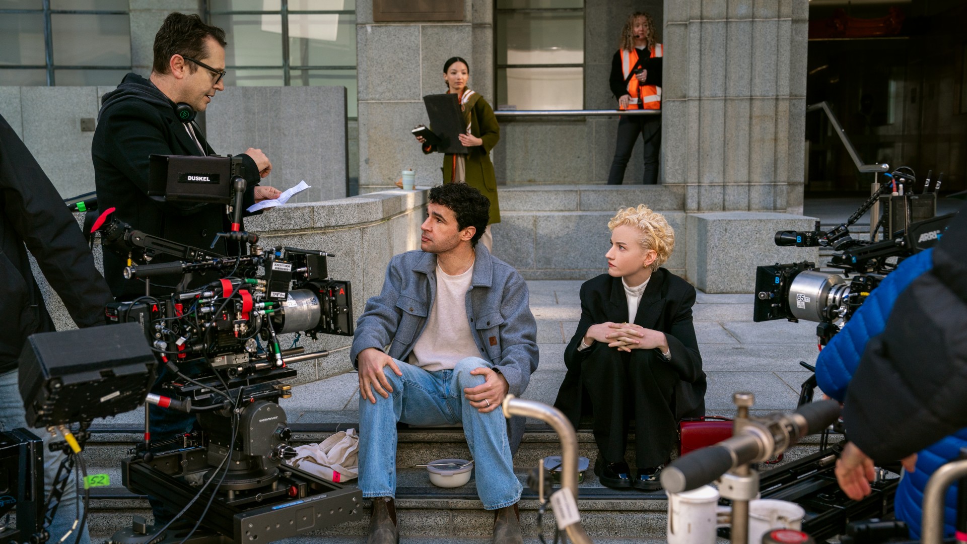 Leigh Whannell directing Christopher Abbott and Julia Garner on the set of 'Wolf Man'