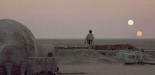 Film still from 'Star Wars Episode IV: A New Hope' showing the sunset on the planet Tatooine.