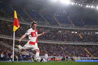 Croatia Euro 2024 squad Luka Modric of Croatia takes a corner kick during the FIFA Series 2024 Egypt match between Croatia and Egypt at 30 June Stadium on March 26, 2024 in Cairo, Egypt. (Photo by Tullio Puglia - FIFA/FIFA via Getty Images)