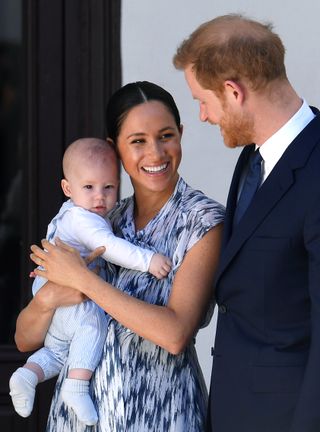 Meghan Markle Prince Harry and baby Archie CAPE TOWN, SOUTH AFRICA - SEPTEMBER 25: Prince Harry, Duke of Sussex, Meghan, Duchess of Sussex and their baby son Archie Mountbatten-Windsor meet Archbishop Desmond Tutu at the Desmond & Leah Tutu Legacy Foundation during their royal tour of South Africa on September 25, 2019 in Cape Town, South Africa. (Photo by Toby Melville - Pool/Getty Images)