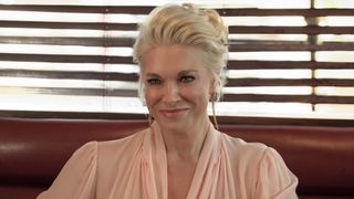 Hannah Waddingham smiling as Rebecca in Season 4 of Ted Lasso.