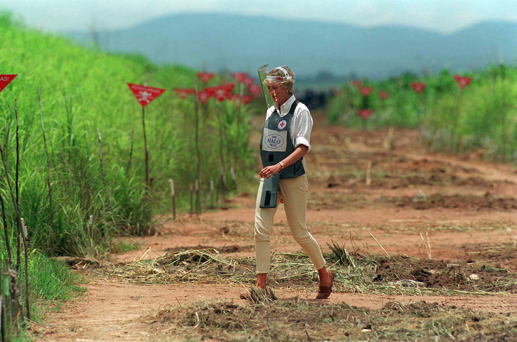 Princess Diana walking through a landmine field