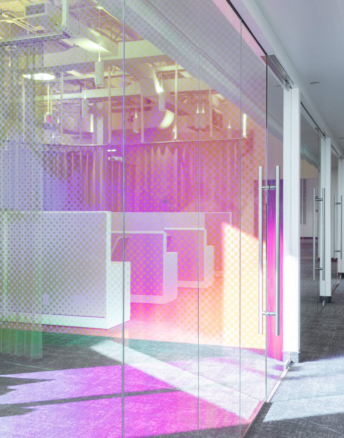 view of colourful and quirky Global Protection Corporation condom factory headquarters