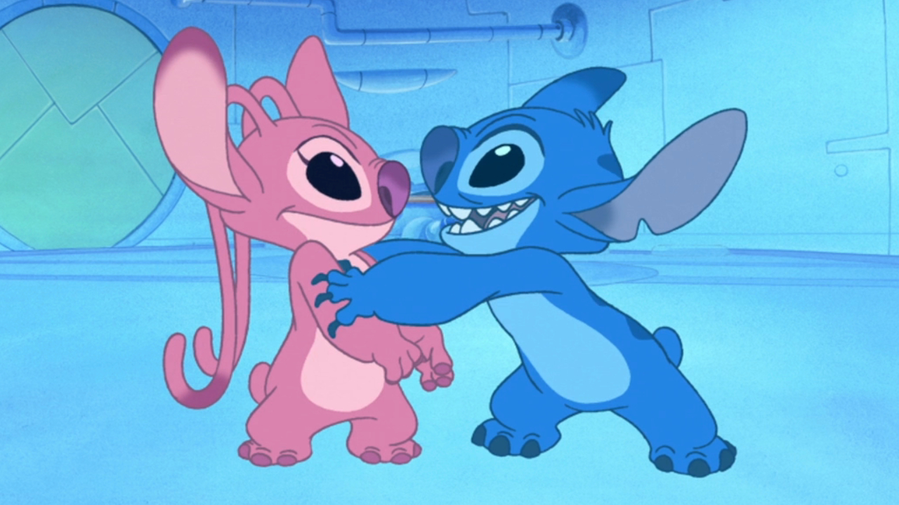 Stitch and Angel smiling in captivity in Lilo & Stitch: The Series, S1 E30 - 