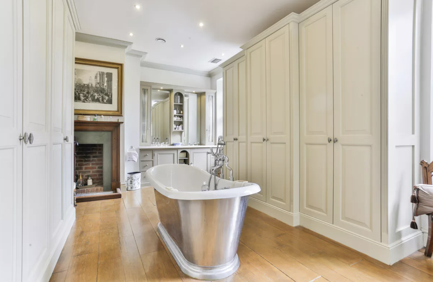 Stand-alone bath tub in bathroom